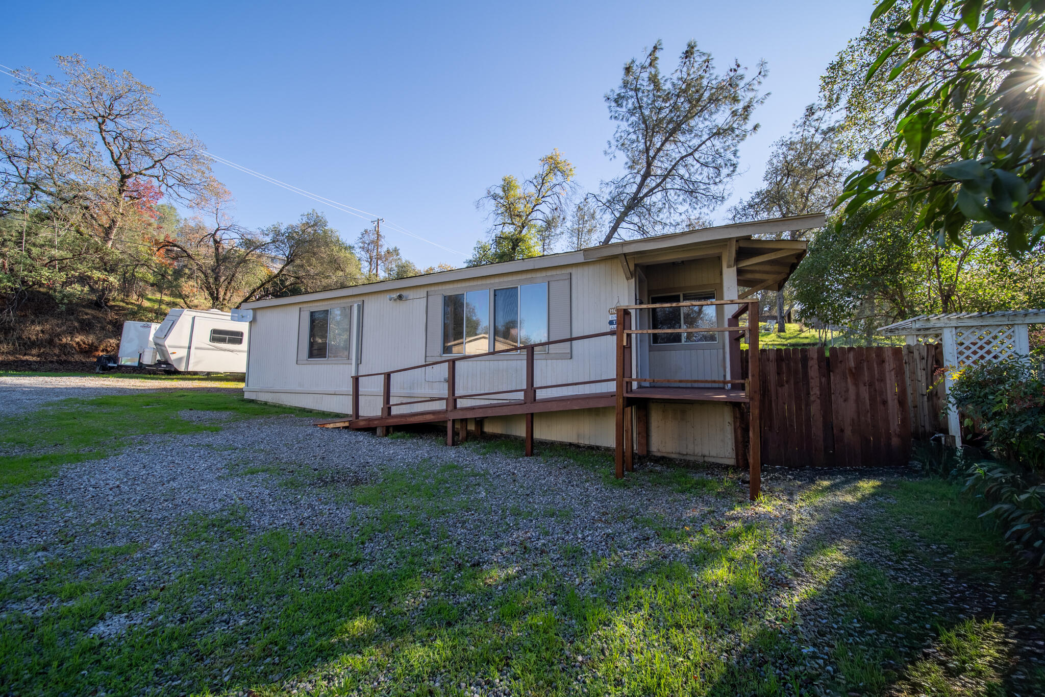 Undisclosed Address Redding, CA 96003 - Photo 27 of 39 a view of backyard with deck and garden