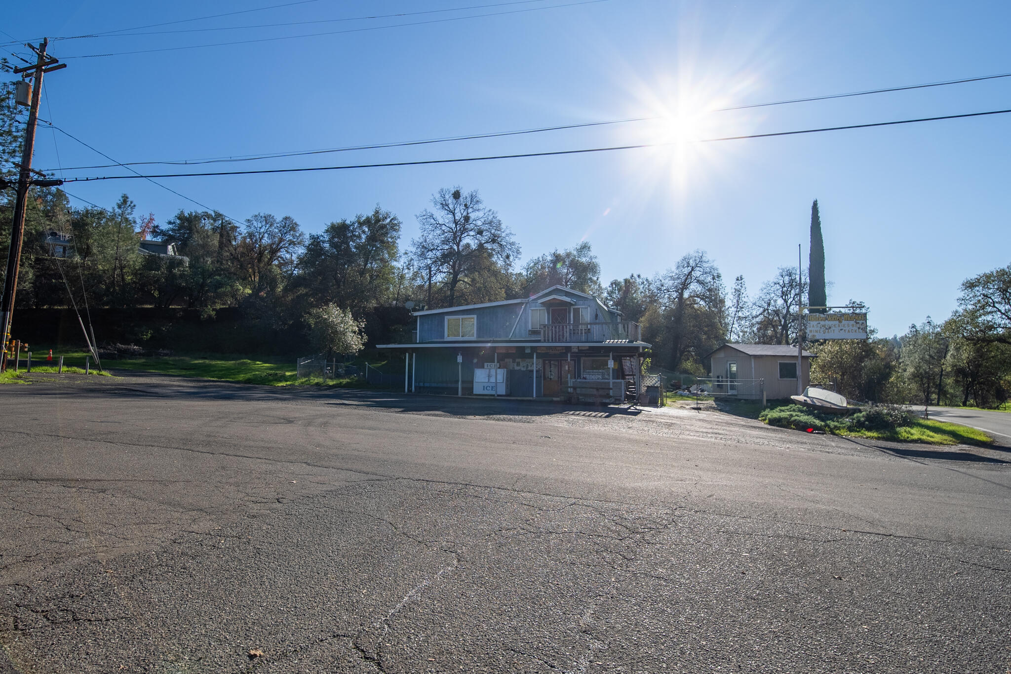 Undisclosed Address Redding, CA 96003 - Photo 30 of 39 a front view of a house with a yard and garage