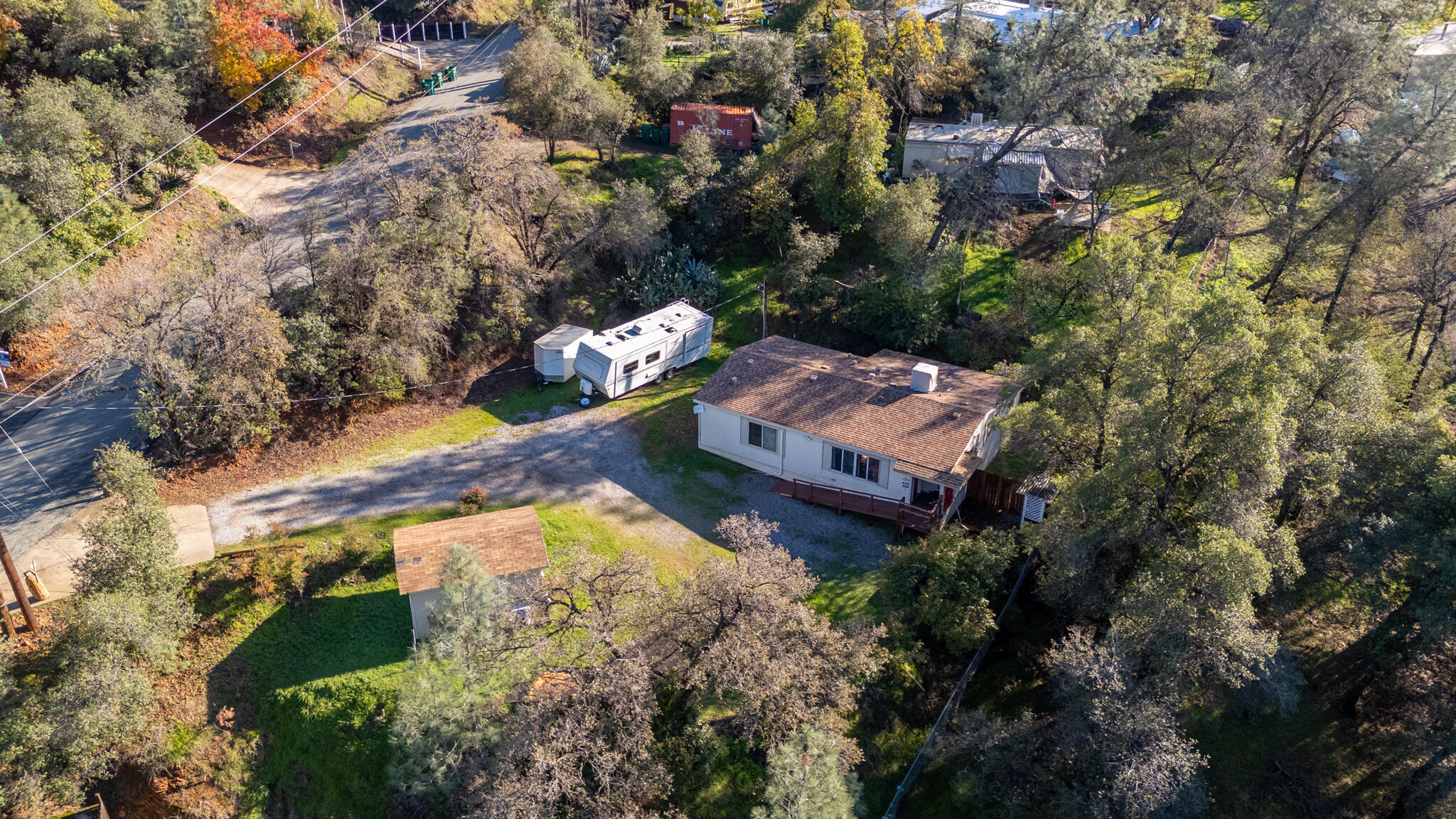 Undisclosed Address Redding, CA 96003 - Photo 31 of 39 an aerial view of a house with a yard