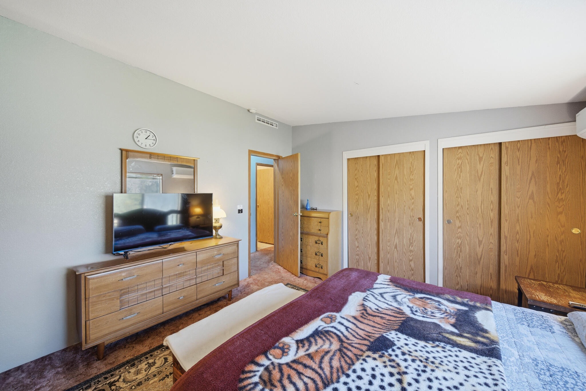 Undisclosed Address Redding, CA 96003 - Photo 9 of 39 a bedroom with a bed and a television