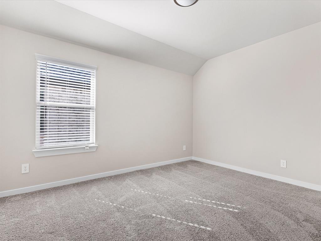643 Medinah Road Red Oak, TX 75154 - Photo 20 of 28 an empty room with a window