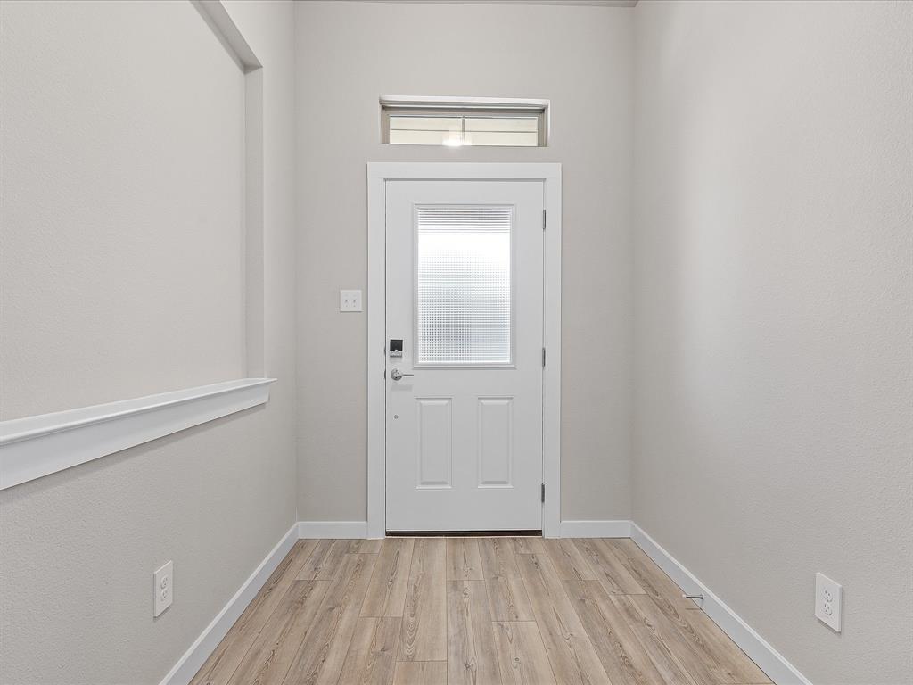 643 Medinah Road Red Oak, TX 75154 - Photo 3 of 28 a view of a room with wooden floor