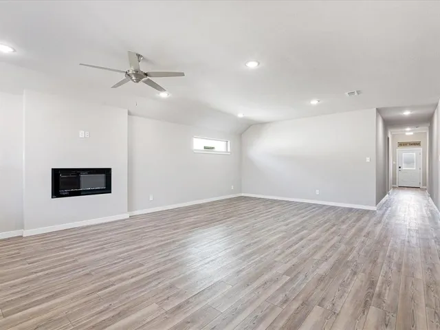 a view of kitchen with wooden floor