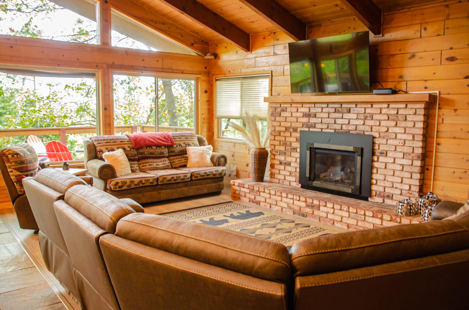 24033 Pine Cone Road Mi Wuk Village, CA 95346 - Photo 15 of 80 a living room with furniture and a fireplace