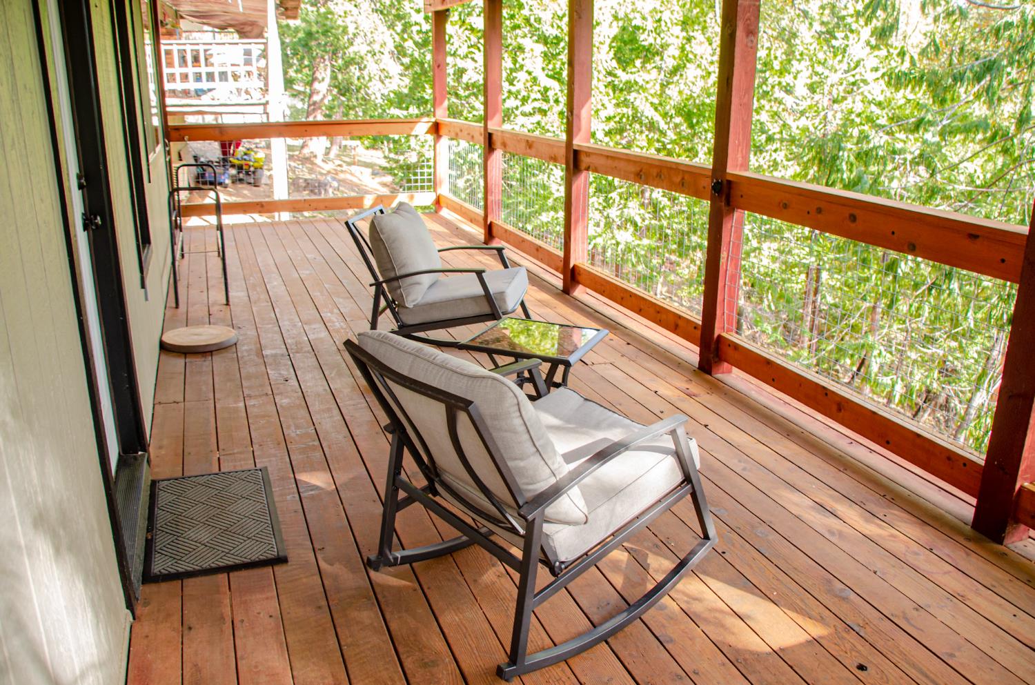 24033 Pine Cone Road Mi Wuk Village, CA 95346 - Photo 63 of 80 a view of balcony with furniture and wooden floor