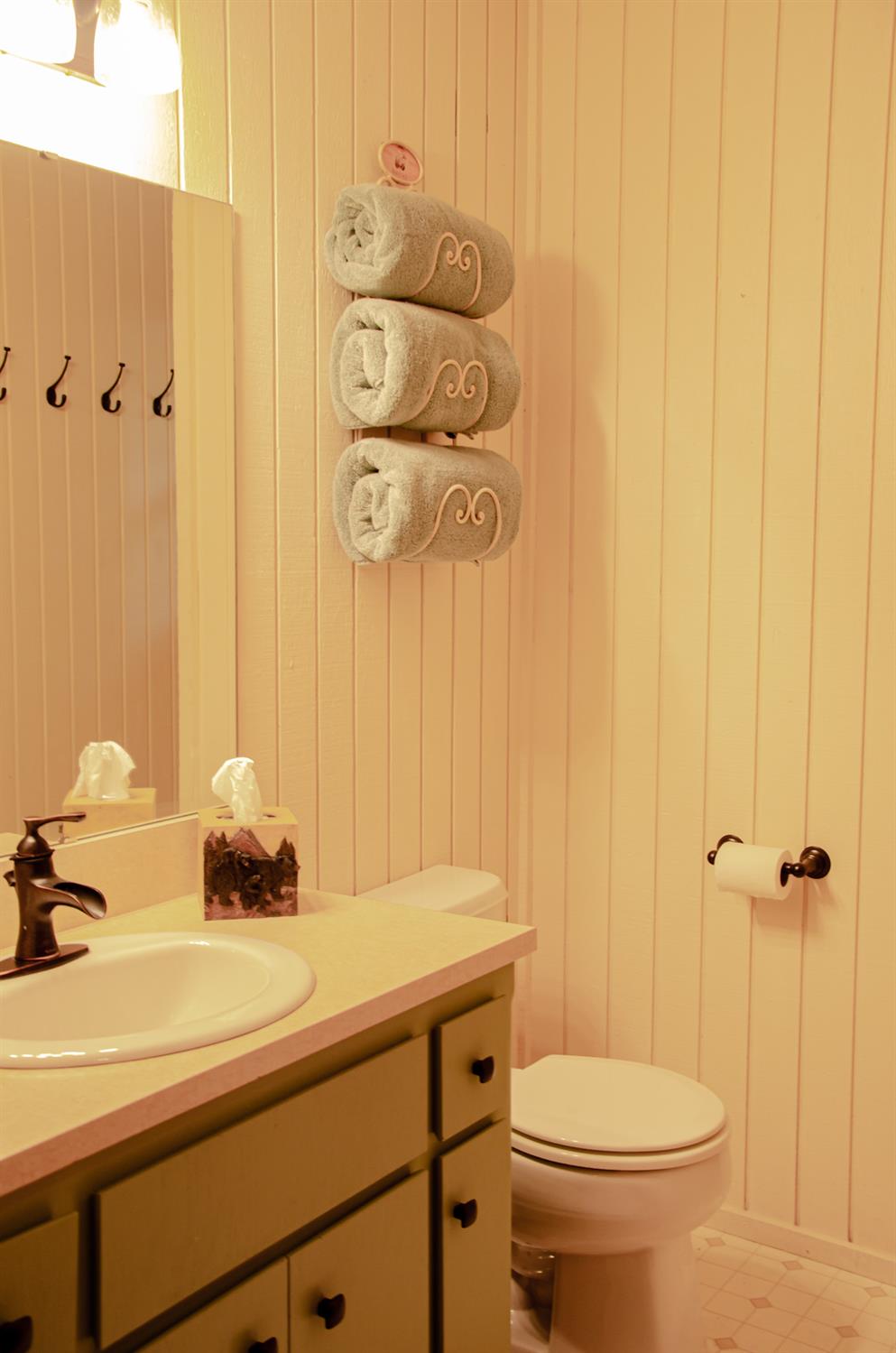 24033 Pine Cone Road Mi Wuk Village, CA 95346 - Photo 69 of 80 a bathroom with a sink a toilet and shower