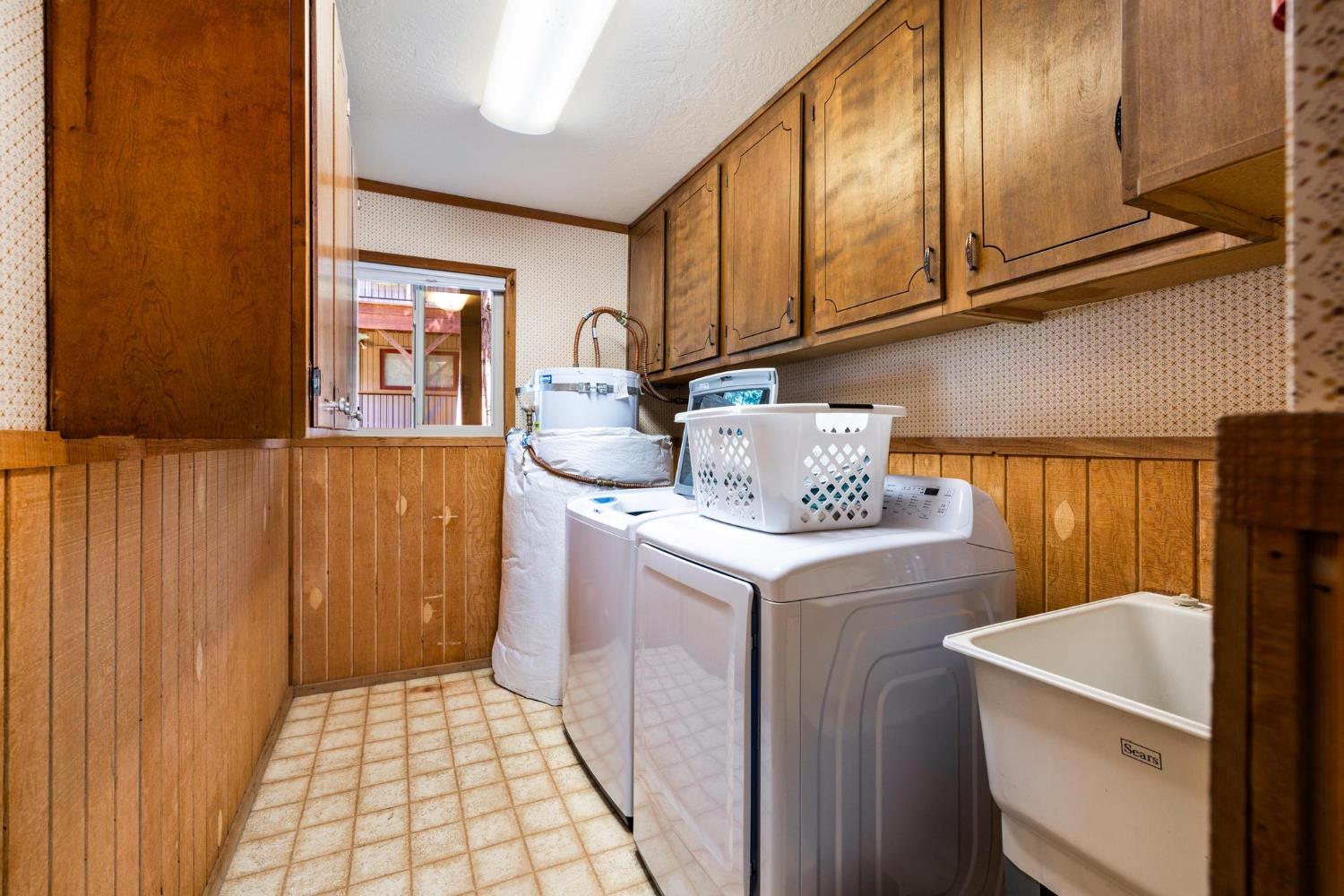 24033 Pine Cone Road Mi Wuk Village, CA 95346 - Photo 72 of 80 a utility room with dryer and washer