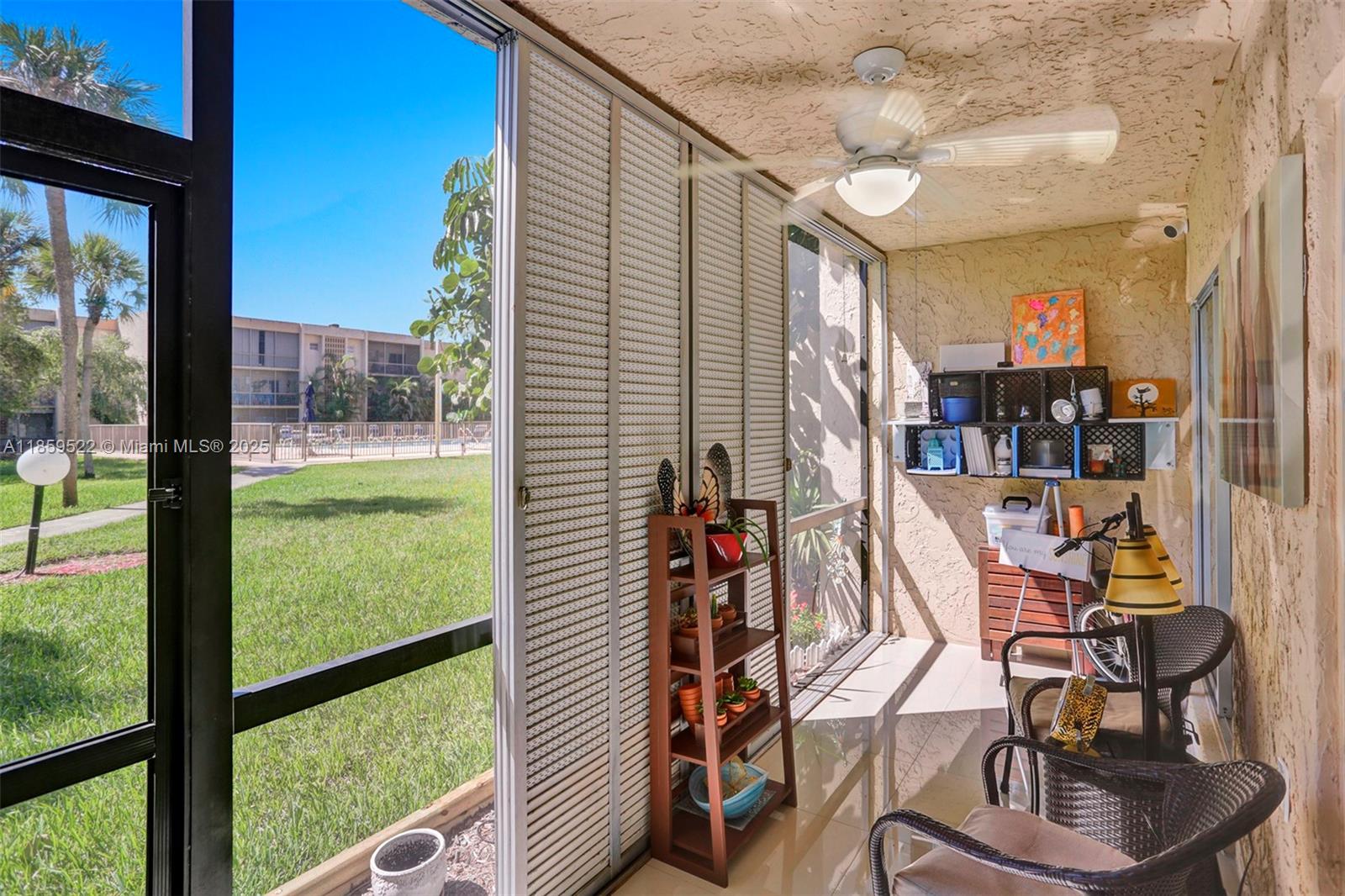 8401 Southwest 107th Avenue, Unit 111E Miami, FL 33173 - Photo 23 of 31 a view of swimming pool with outdoor seating