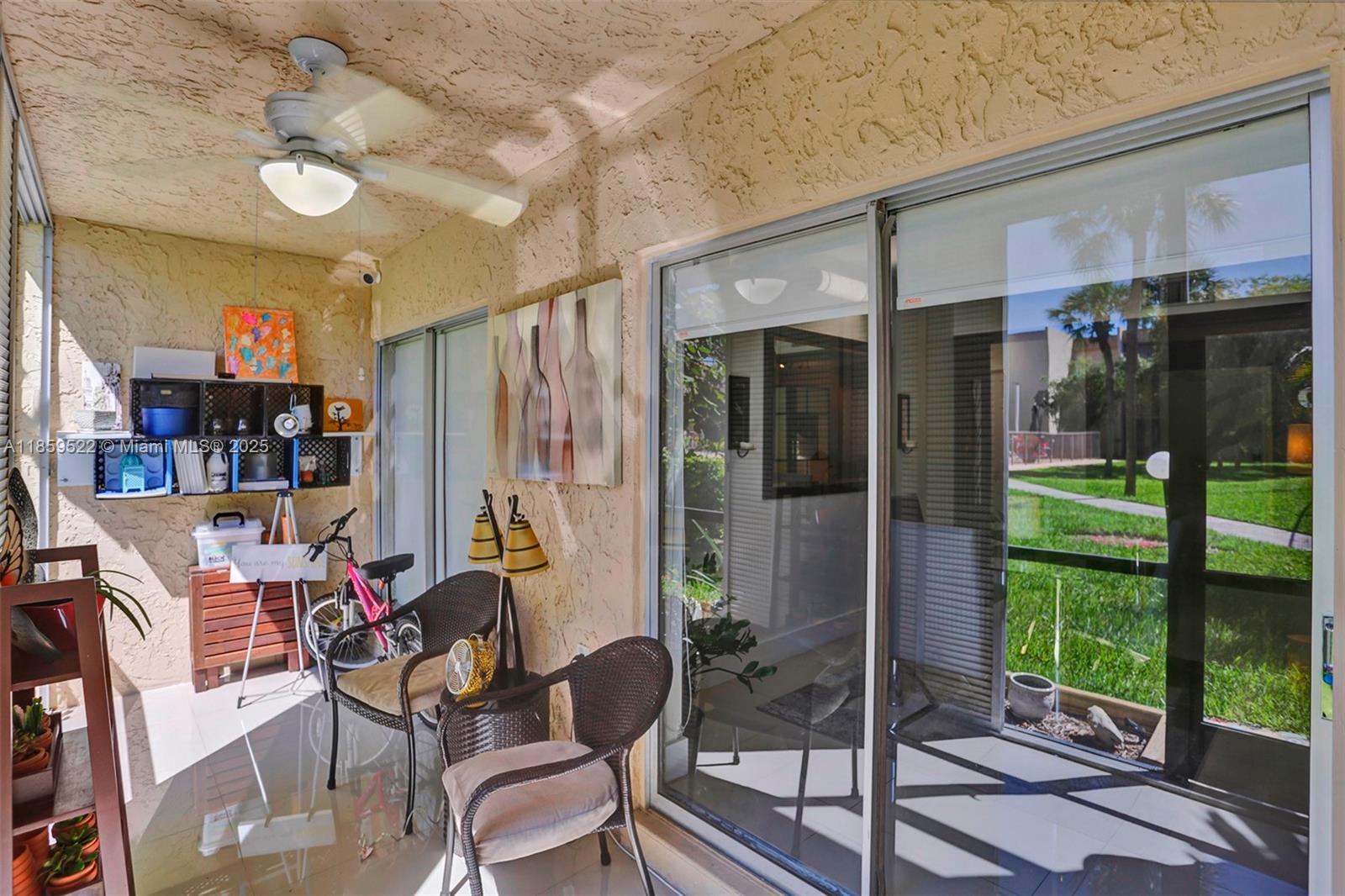 8401 Southwest 107th Avenue, Unit 111E Miami, FL 33173 - Photo 24 of 31 a view of outdoor space with seating area