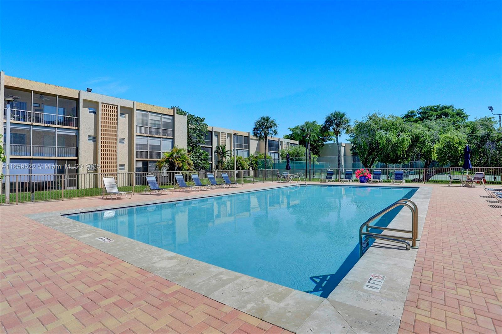 8401 Southwest 107th Avenue, Unit 111E Miami, FL 33173 - Photo 29 of 31 a view of swimming pool from a balcony