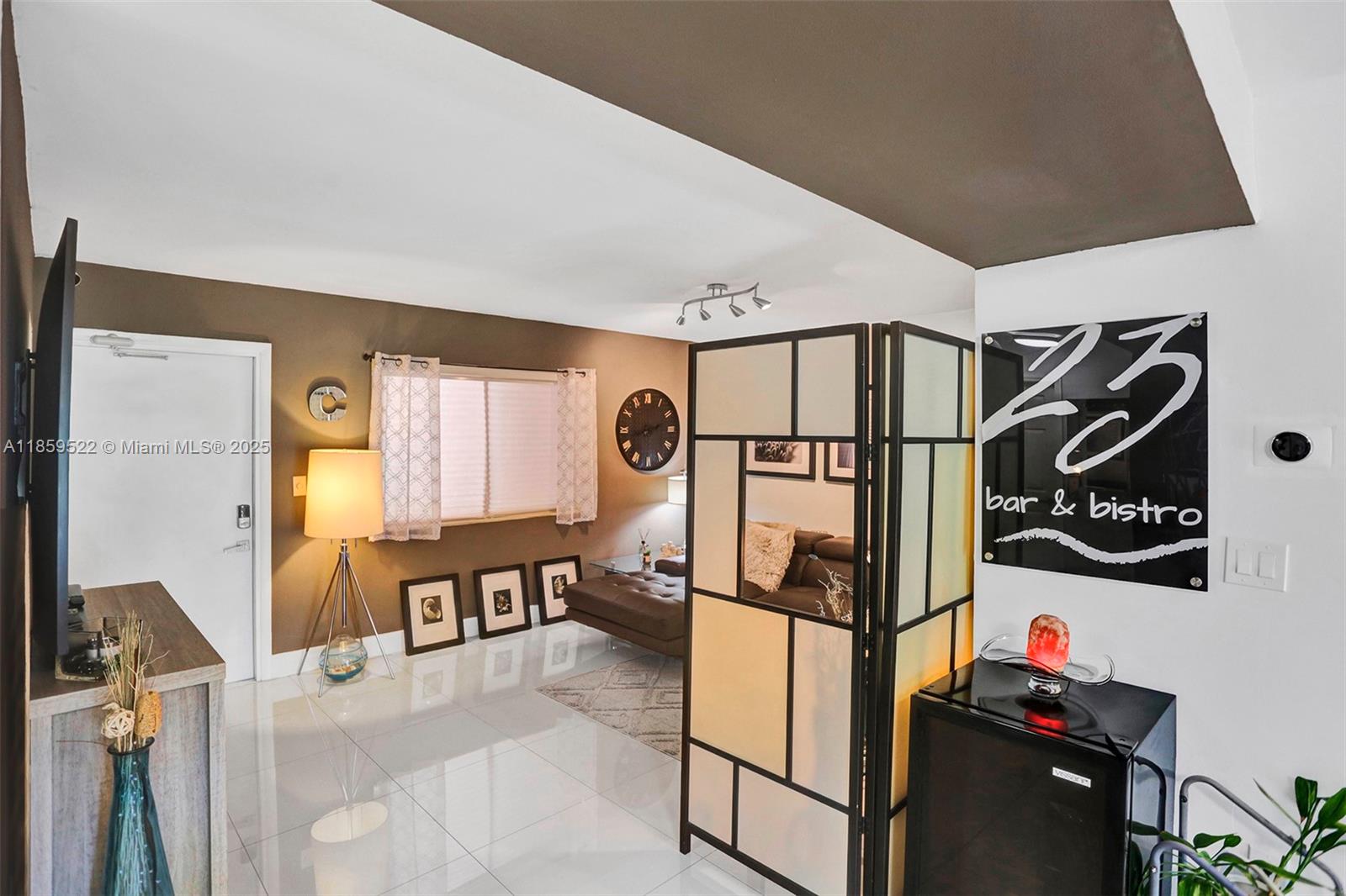 8401 Southwest 107th Avenue, Unit 111E Miami, FL 33173 - Photo 3 of 31 a view of a room with gym equipment