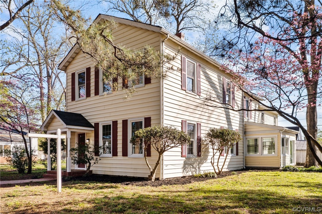 302 Main Street West Point, VA 23181 - Photo 1 of 24 a front view of a house with a yard