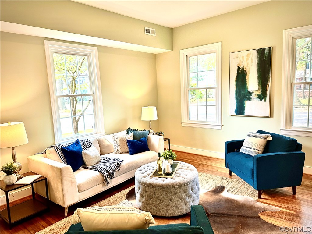 302 Main Street West Point, VA 23181 - Photo 12 of 24 a living room with furniture and a lamp