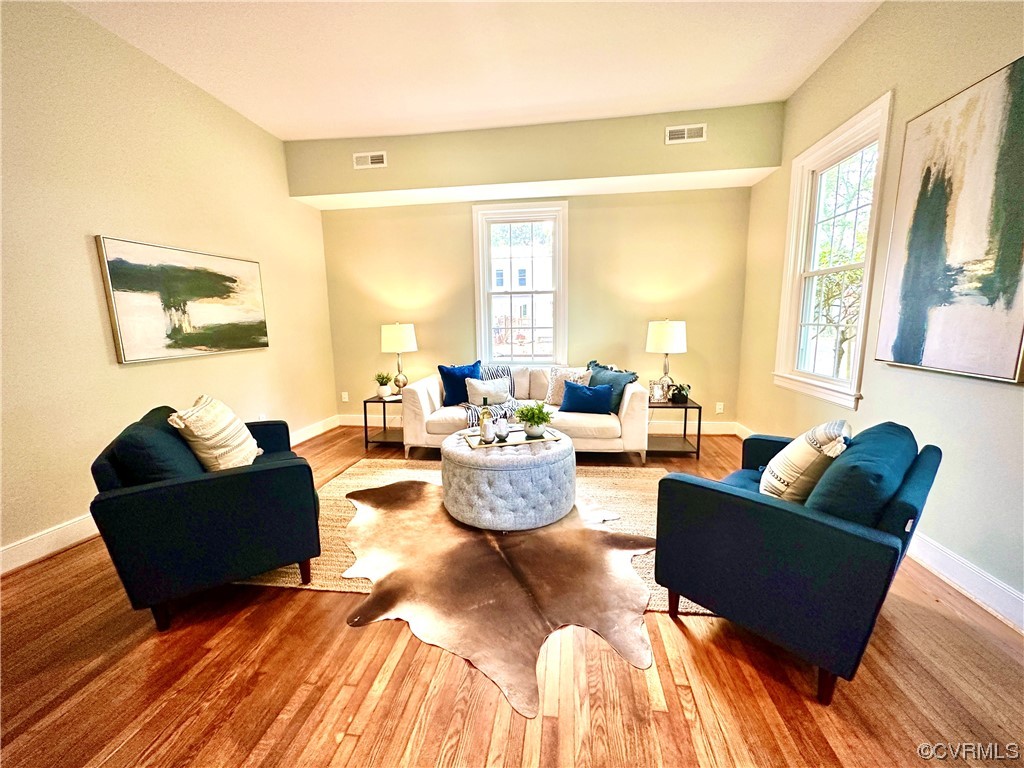 302 Main Street West Point, VA 23181 - Photo 5 of 24 a living room with furniture and a large window