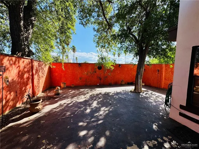 a backyard of a house with an outdoor space