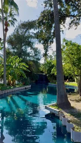 a view of lake with green space