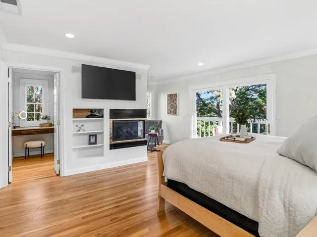 a bedroom with a bed and lamp