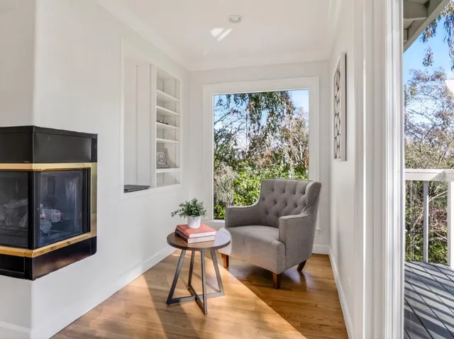 a room with a table and a mirror