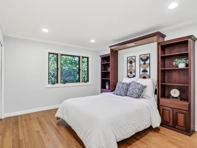 a kitchen with a sink a counter top space and cabinets