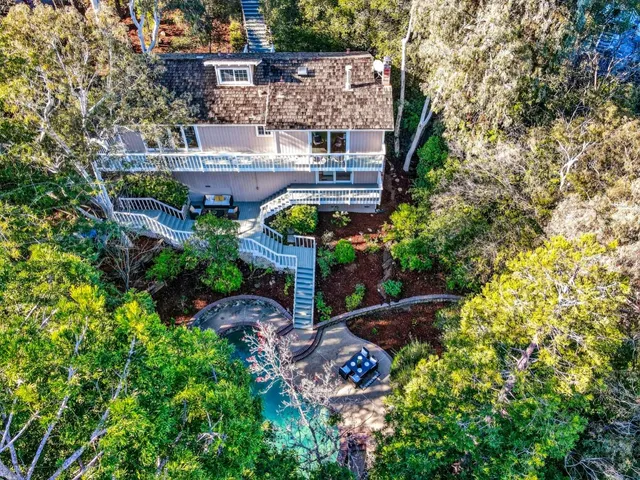 a view of balcony with wooden floor and outdoor space