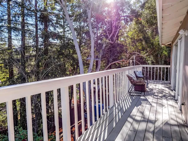 an aerial view of a house outdoor space and street view