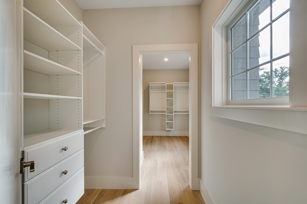 638 Webster Street, Unit 638 Needham, MA 02492 - Photo 13 of 29 a view of walk in closet with window