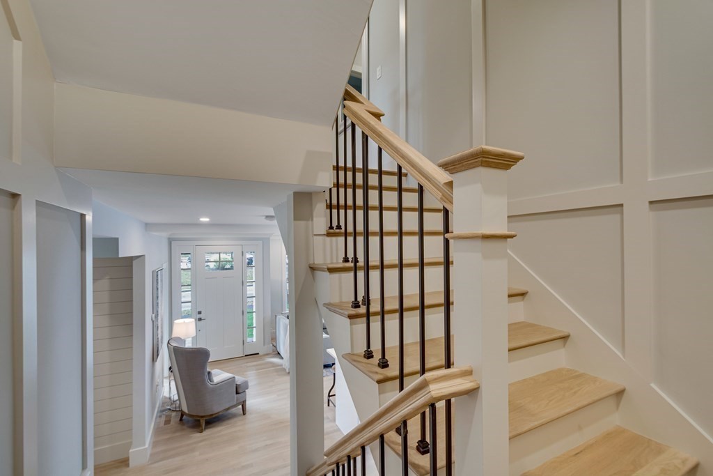 638 Webster Street, Unit 638 Needham, MA 02492 - Photo 20 of 29 a view of entryway with wooden floor and stairs