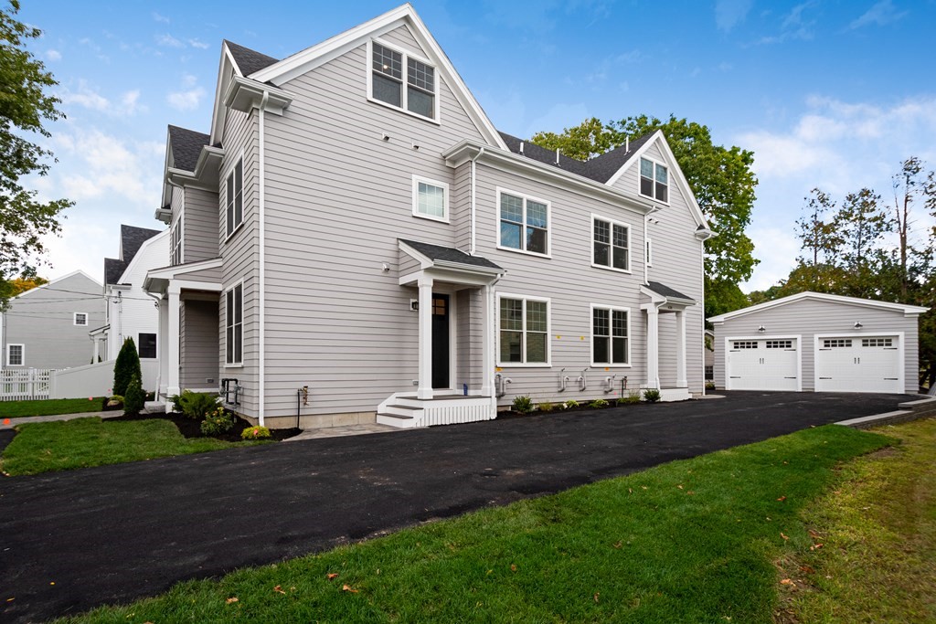 638 Webster Street, Unit 638 Needham, MA 02492 - Photo 2 of 29 a view of front a house with a yard