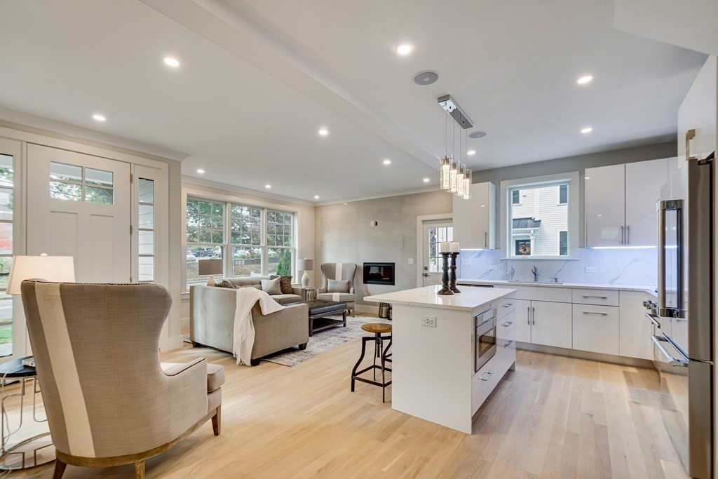 638 Webster Street, Unit 638 Needham, MA 02492 - Photo 4 of 29 a view of kitchen with granite countertop cabinets table and chairs