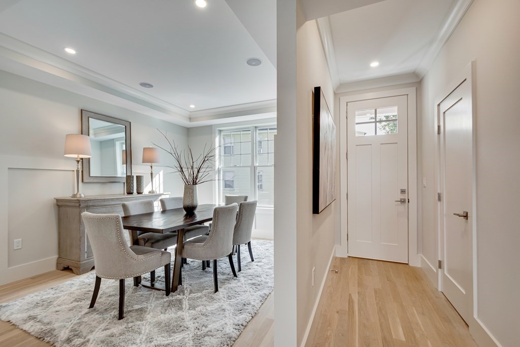 638 Webster Street, Unit 638 Needham, MA 02492 - Photo 9 of 29 a view of a dining room with furniture