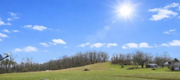 a view of a grassy field