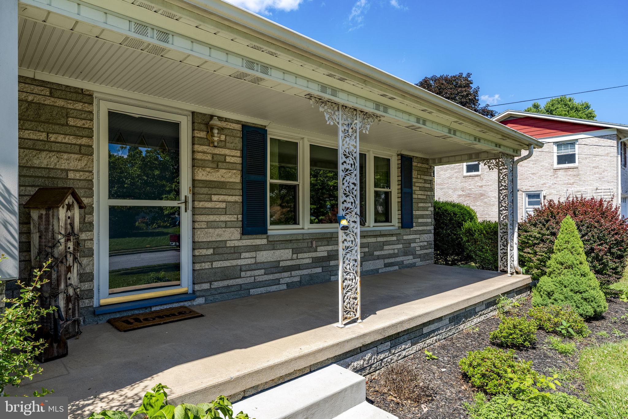 4107 Trowbridge Road York, PA 17402 - Photo 2 of 50 Charming porch with inviting details.