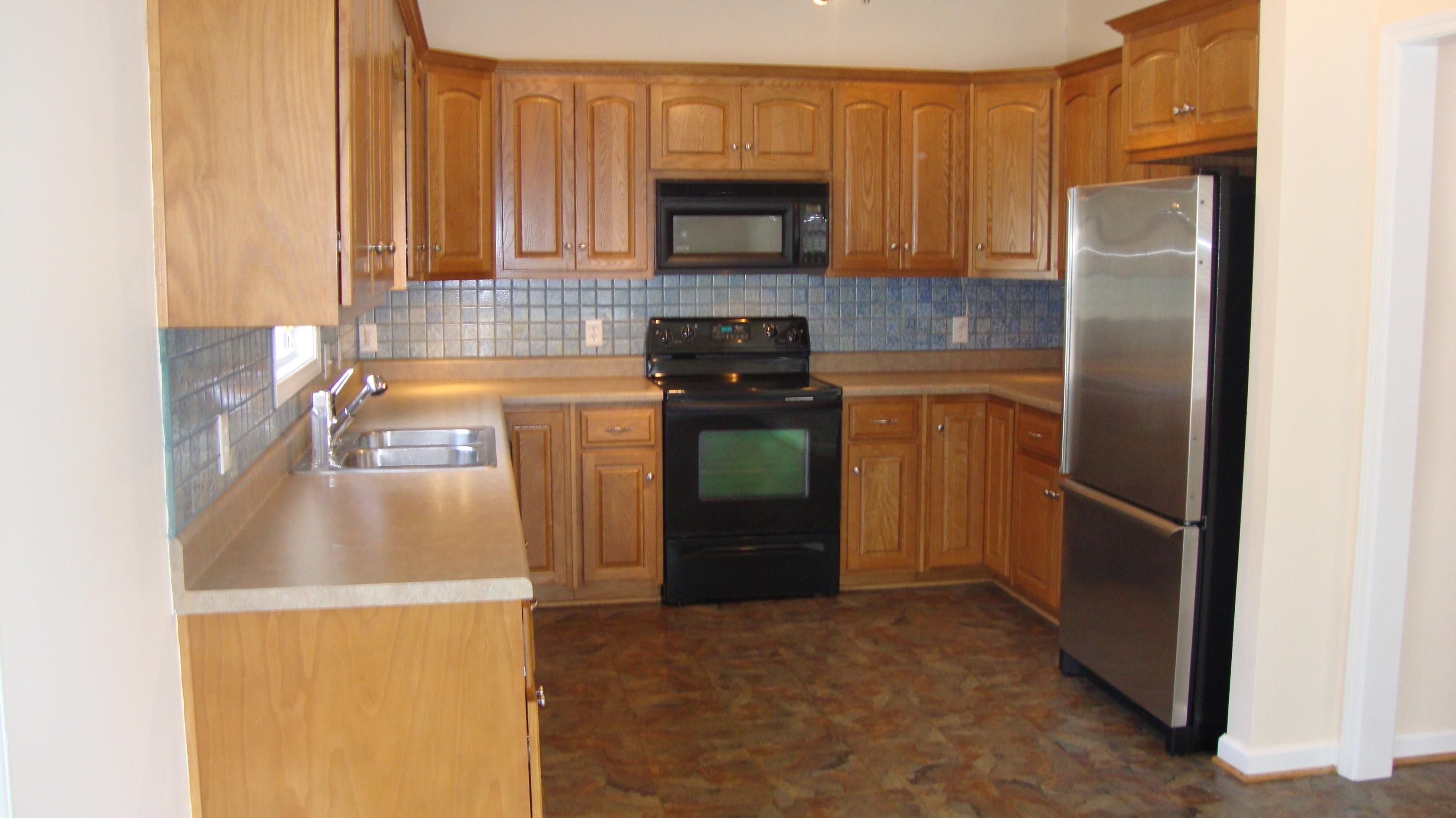 1942 Millbridge Road Salem, VA 24153 - Photo 4 of 52 Kitchen With Ceramic Tile Back Splash