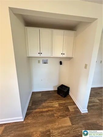 a view of kitchen with wooden floor