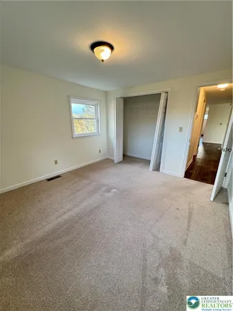 a view of a livingroom with a staircase