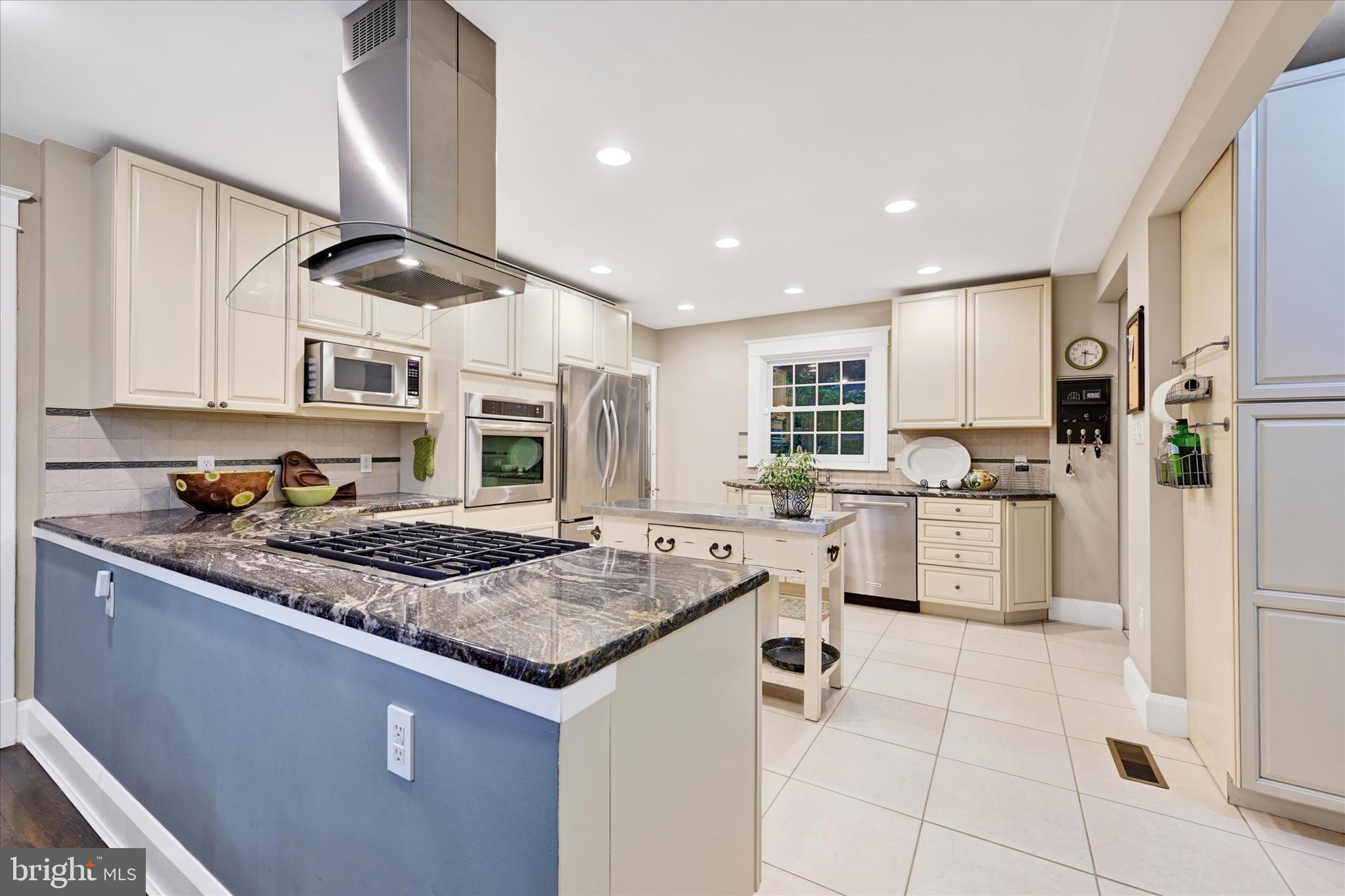 1 Merrymount Road Baltimore, MD 21210 - Photo 17 of 53 a kitchen with a stove a sink and a refrigerator