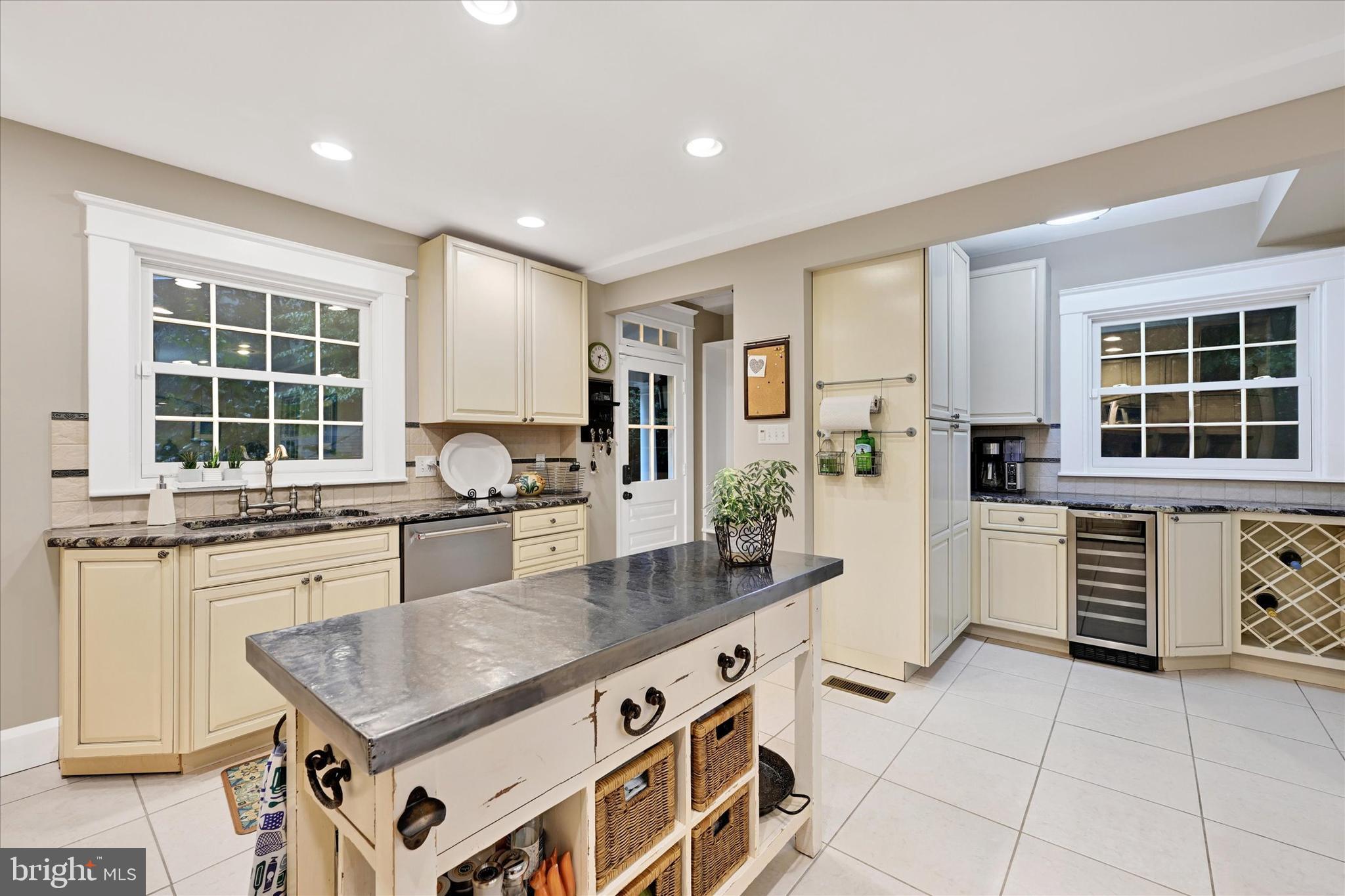 1 Merrymount Road Baltimore, MD 21210 - Photo 21 of 53 a kitchen with stainless steel appliances granite countertop a stove and a sink