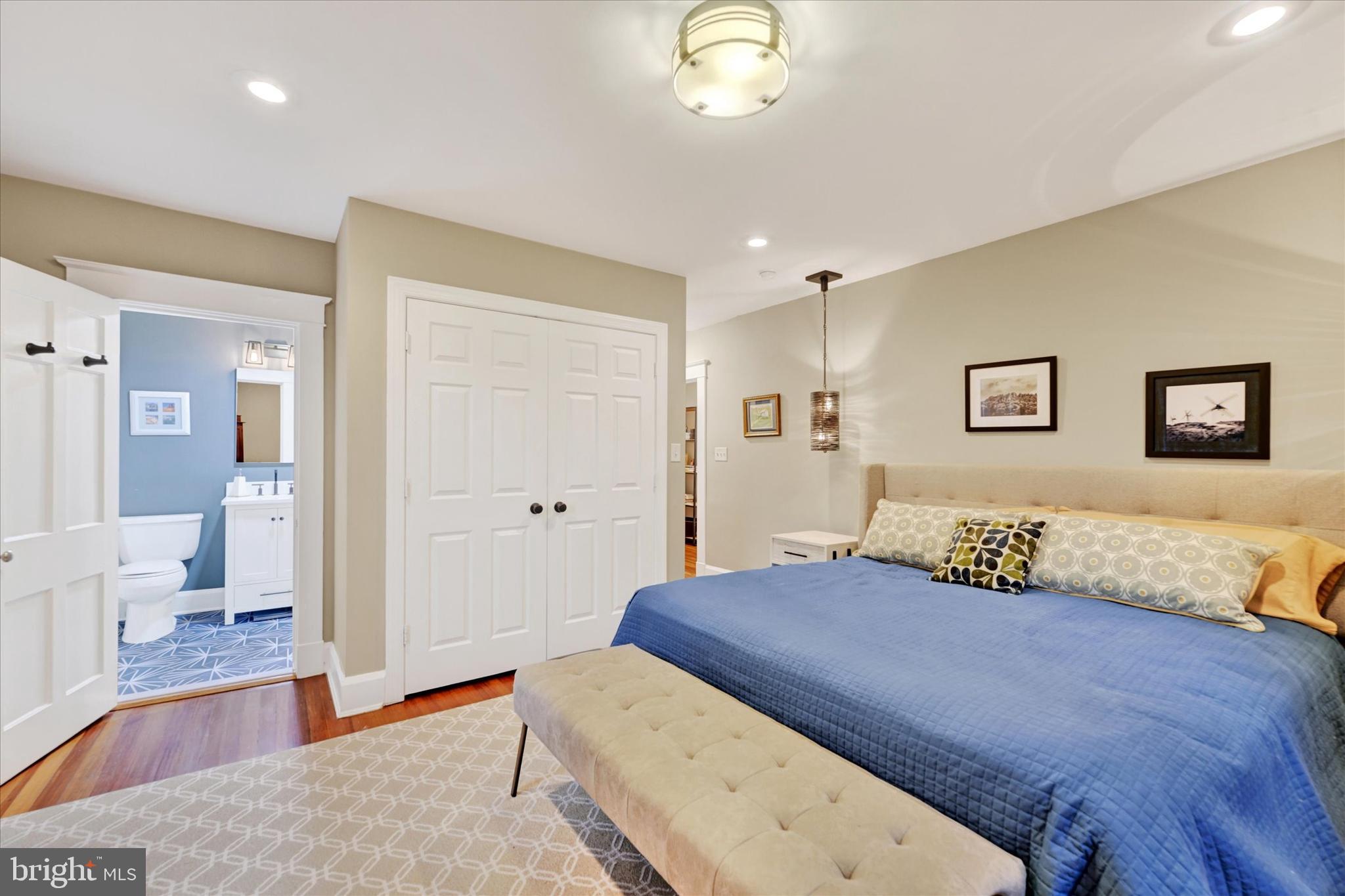 1 Merrymount Road Baltimore, MD 21210 - Photo 25 of 53 a bedroom with a large bed and a chandelier