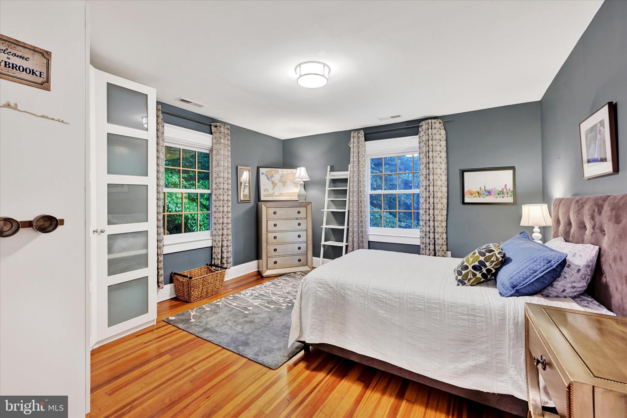 1 Merrymount Road Baltimore, MD 21210 - Photo 27 of 53 a bed sitting in a bedroom next to a window