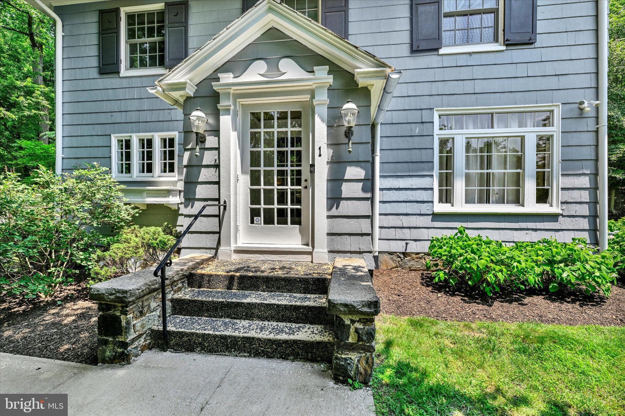 1 Merrymount Road Baltimore, MD 21210 - Photo 3 of 53 a front view of a house with a garden