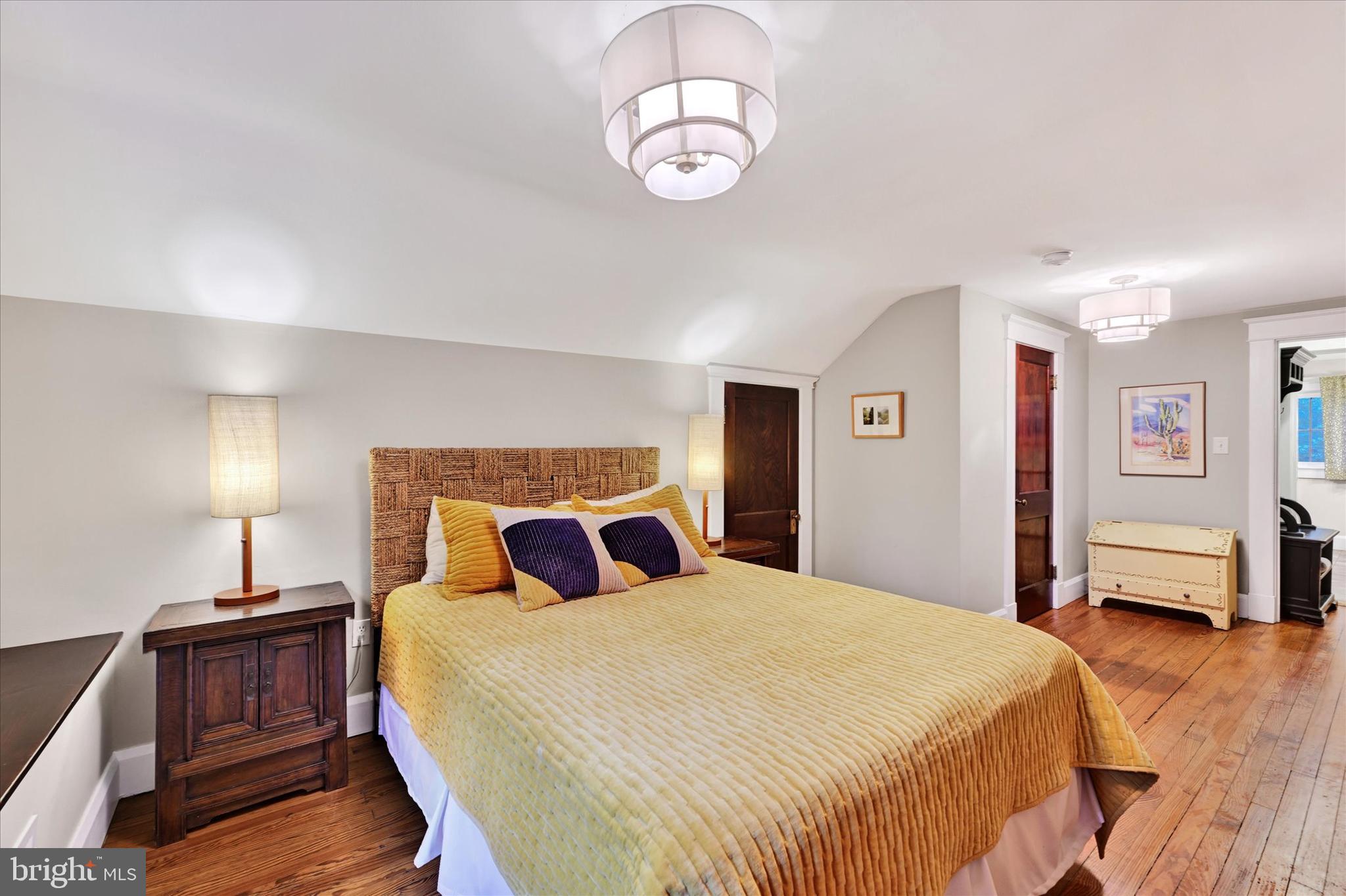 1 Merrymount Road Baltimore, MD 21210 - Photo 34 of 53 a bedroom with a bed and wooden floor