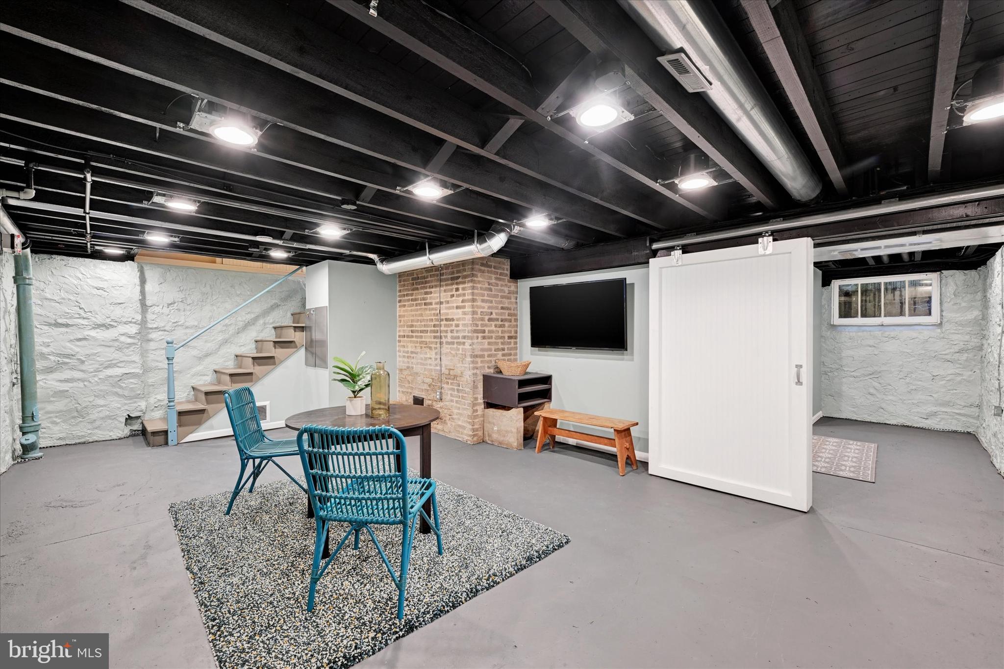 1 Merrymount Road Baltimore, MD 21210 - Photo 41 of 53 a view of a livingroom with furniture and a wooden deck