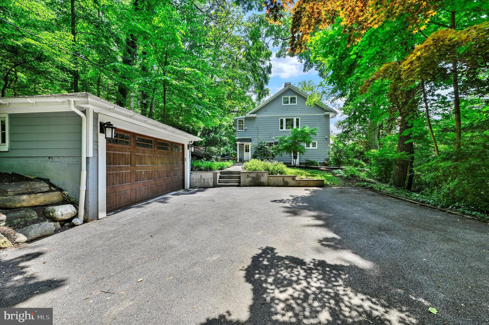 1 Merrymount Road Baltimore, MD 21210 - Photo 46 of 53 a front view of a house with a yard and garage