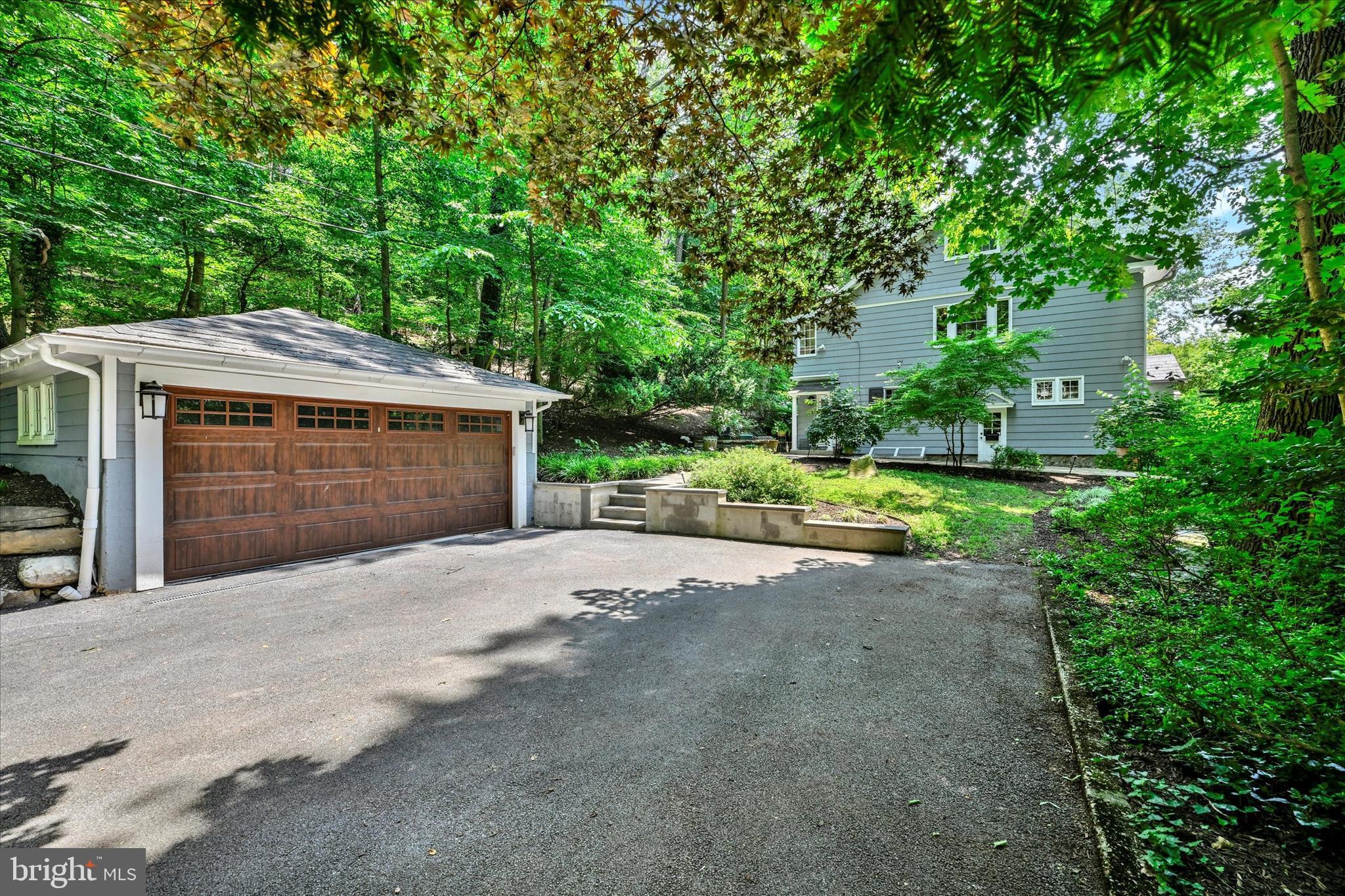 1 Merrymount Road Baltimore, MD 21210 - Photo 47 of 53 a front view of a house with a garden and yard