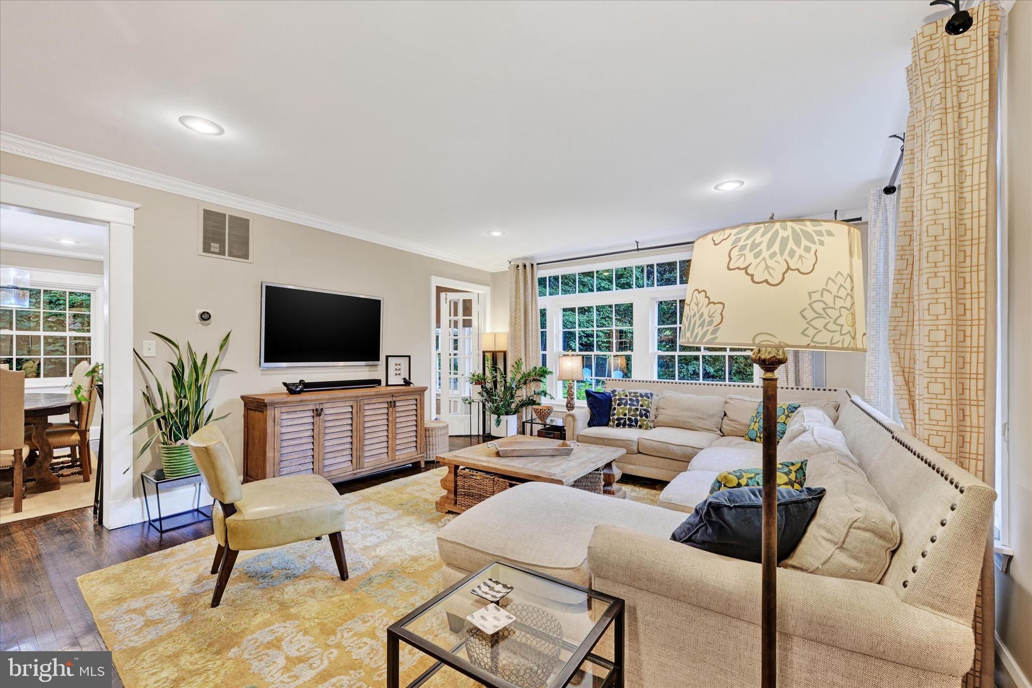 1 Merrymount Road Baltimore, MD 21210 - Photo 8 of 53 a living room with furniture and a flat screen tv