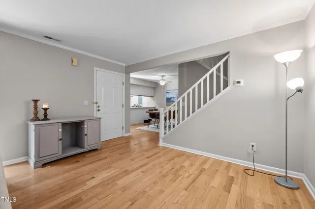 a view of a kitchen with a sink and a stove top oven