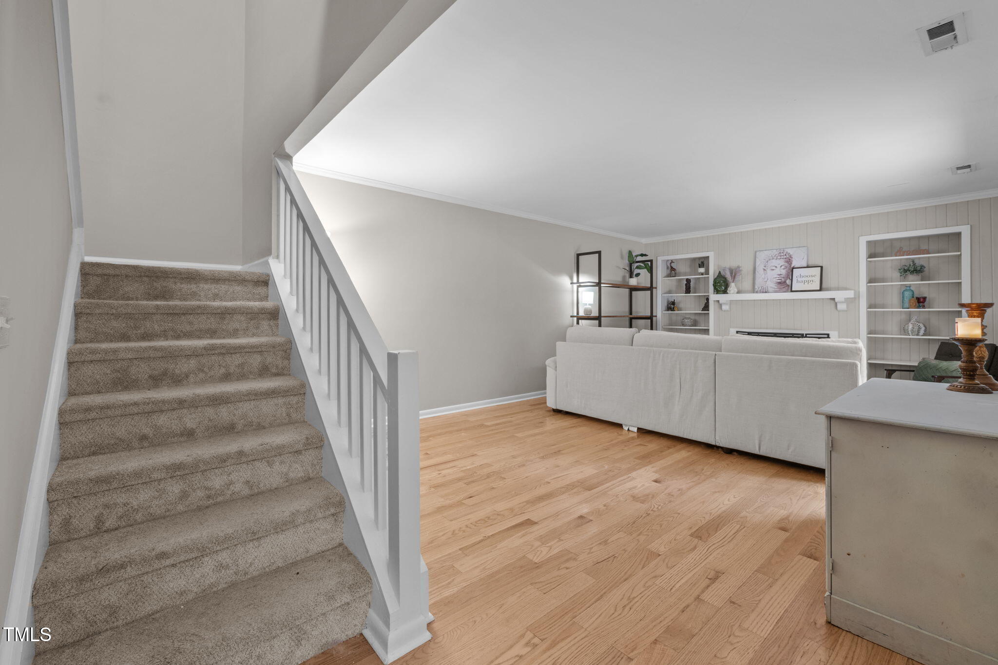 167 Springberry Lane Chapel Hill, NC 27517 - Photo 16 of 37 a view of a kitchen with wooden floor and stairs
