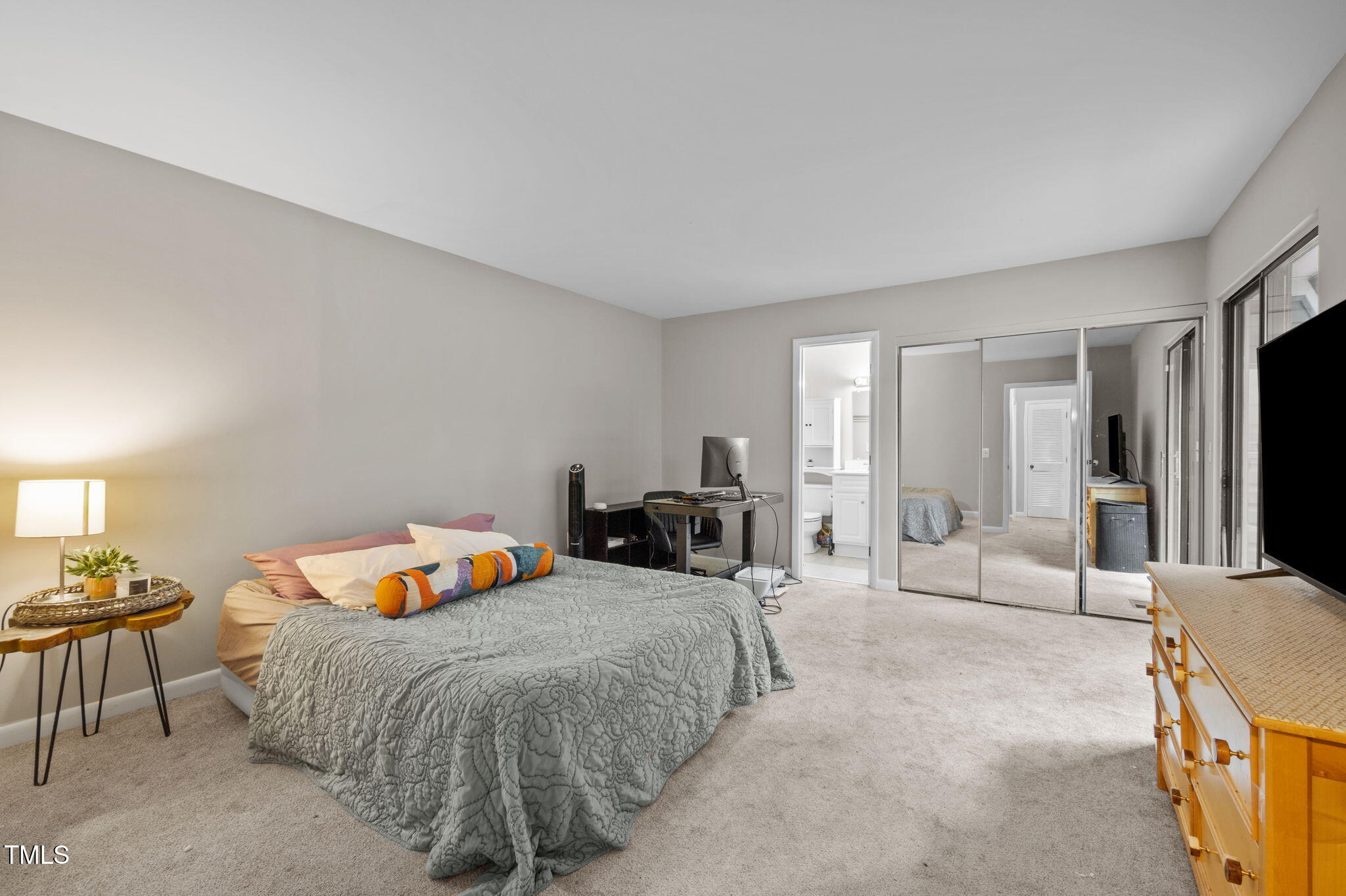 167 Springberry Lane Chapel Hill, NC 27517 - Photo 18 of 37 a bedroom with a bed and couch