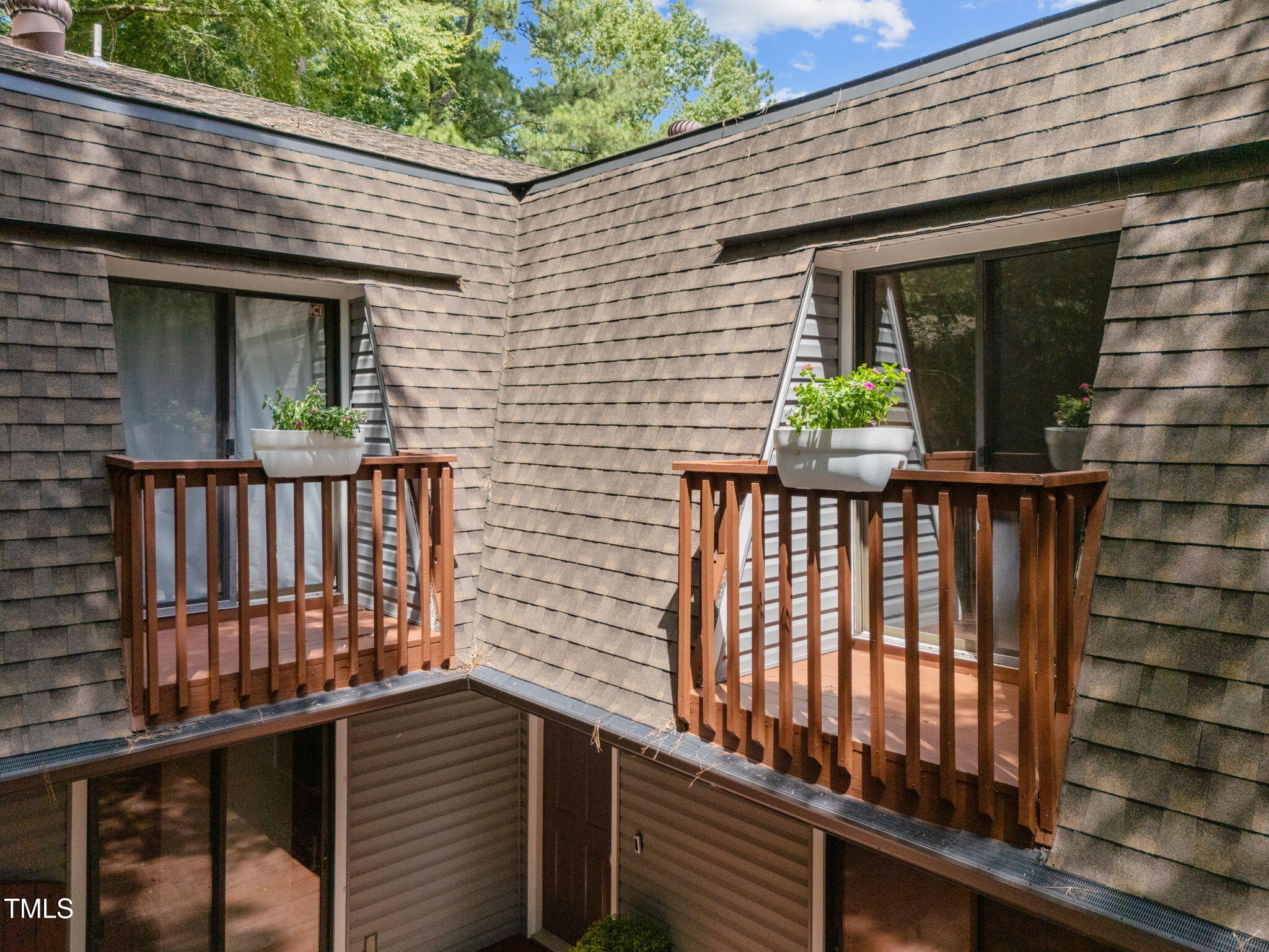 167 Springberry Lane Chapel Hill, NC 27517 - Photo 28 of 37 a view of a brick house with a large window