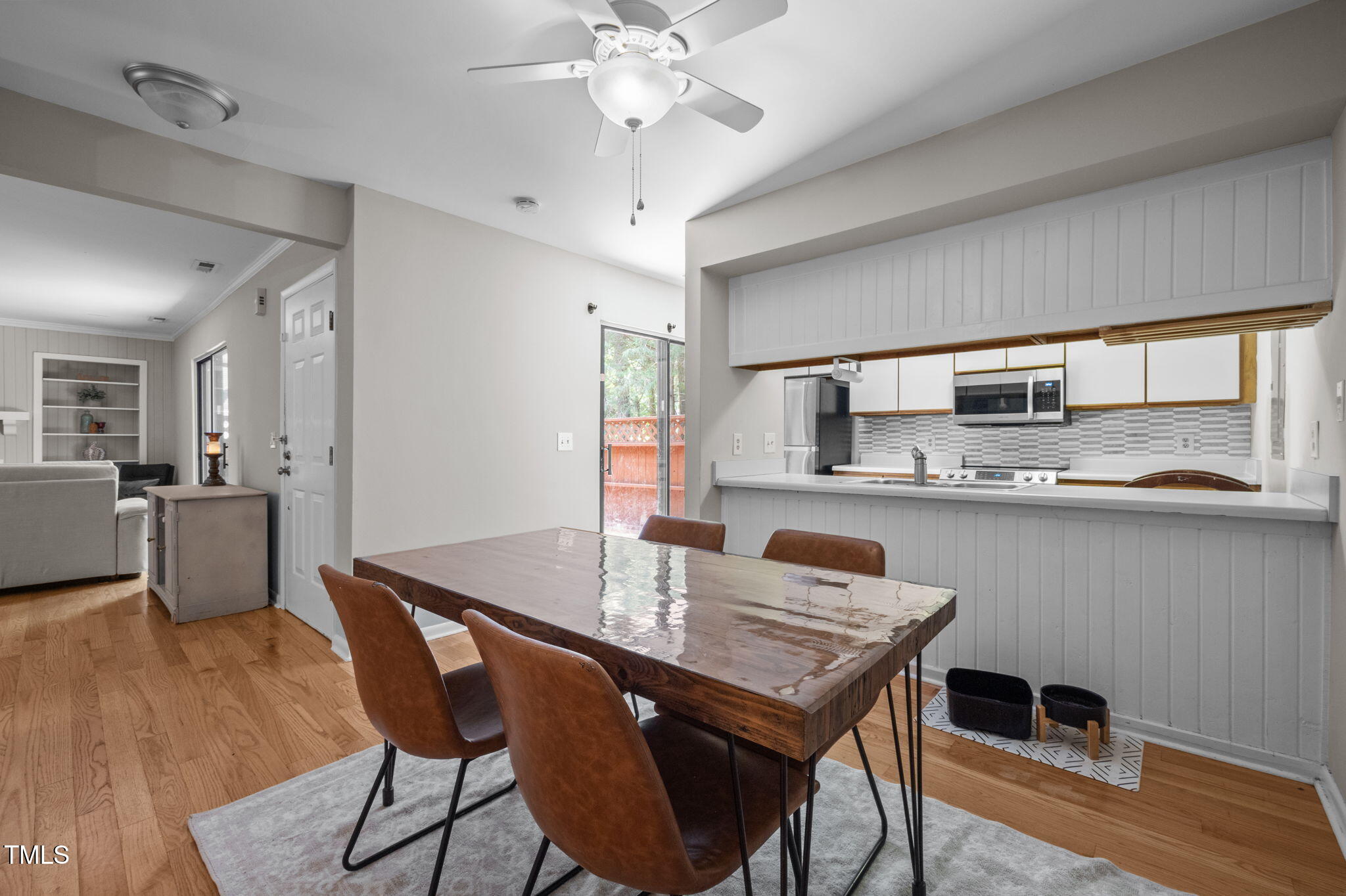 167 Springberry Lane Chapel Hill, NC 27517 - Photo 8 of 37 a view of a dining room with furniture and wooden floor